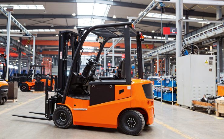 new-forklift-is-standing-on-modern-warehouse-2024-11-07-13-26-42-utc