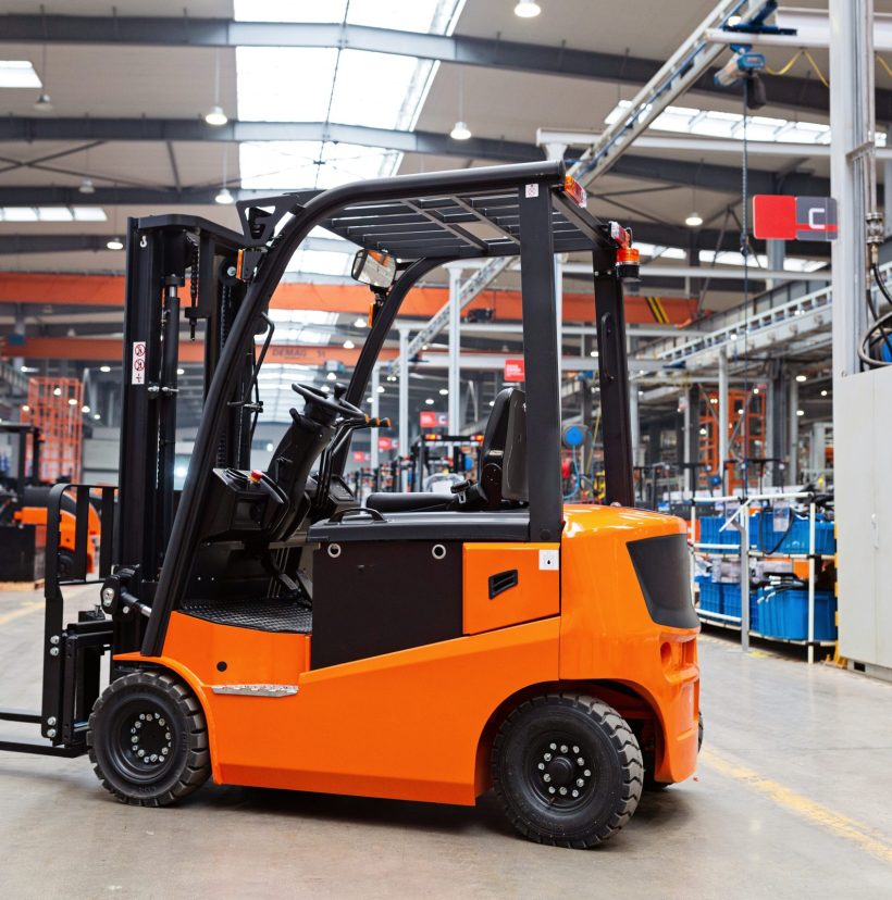 new-forklift-is-standing-on-modern-warehouse-2024-11-07-13-26-42-utc